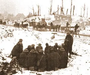 Canadian troops passing the ruins of the Cloth Hall. Image from Library and Archives Canada.